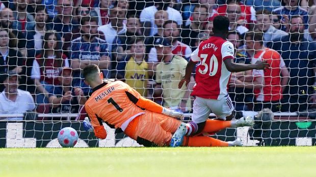 Arsenal's Eddie Nketiah (right) scores their side's first goal of the gameduring the Premier League match at the Emirates Stadium, London. Picture date: Sunday May 8, 2022. (Photo by Mike Egerton/PA Images via Getty Images)