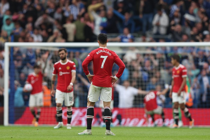 BRIGHTON, ENGLAND - MAY 07: A dejected Cristiano Ronaldo of Manchester United during the Premier League match between Brighton & Hove Albion and Manchester United at American Express Community Stadium on May 7, 2022 in Brighton, United Kingdom. (Photo by Matthew Ashton - AMA/Getty Images)