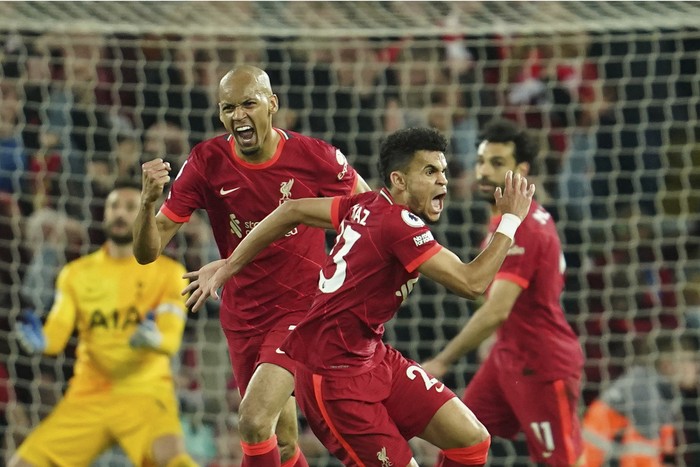 Liverpools Luis Diaz celebrates after scoring his sides opening goal during the English Premier League soccer match between Liverpool and Tottenham Hotspur at Anfield stadium in Liverpool, England, Saturday, May 7, 2022. (AP Photo/Jon Super)