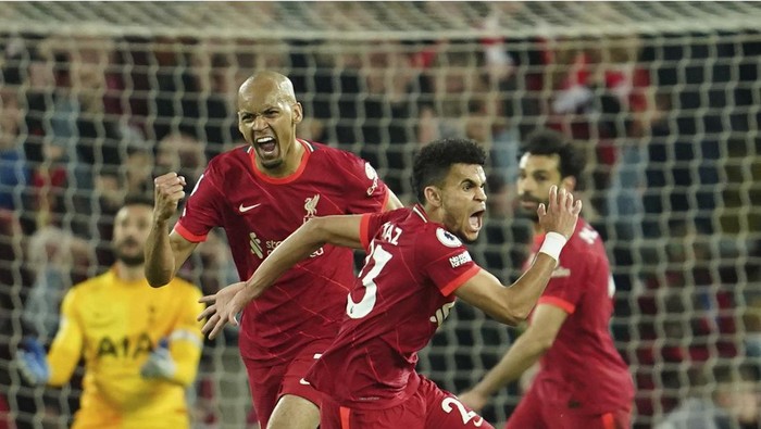 Liverpools Luis Diaz celebrates after scoring his sides opening goal during the English Premier League soccer match between Liverpool and Tottenham Hotspur at Anfield stadium in Liverpool, England, Saturday, May 7, 2022. (AP Photo/Jon Super)