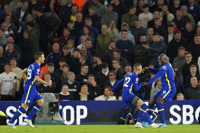 Chelseas Romelu Lukaku, right, celebrates with teammates after scoring his sides third goal during the English Premier League soccer match between Leeds United and Chelsea at Elland Road in Leeds, England, Wednesday May 11, 2022. (AP Photo/Jon Super)