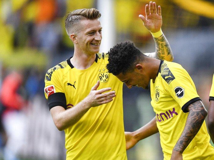 Dortmund's captain Marco Reus reacts disappointed during the German Bundesliga soccer match between Borussia Dortmund and Bayer Leverkusen in Dortmund, Germany, Sunday, Feb. 6, 2022. (AP Photo/Martin Meissner)