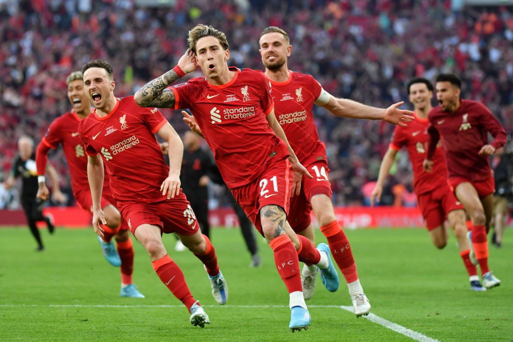 LONDON, ENGLAND - MAY 14: Kostas Tsimikas of Liverpool celebrates following their team's victory in the penalty shoot out during The FA Cup Final match between Chelsea and Liverpool at Wembley Stadium on May 14, 2022 in London, England. (Photo by Tom Dulat - The FA/The FA via Getty Images)