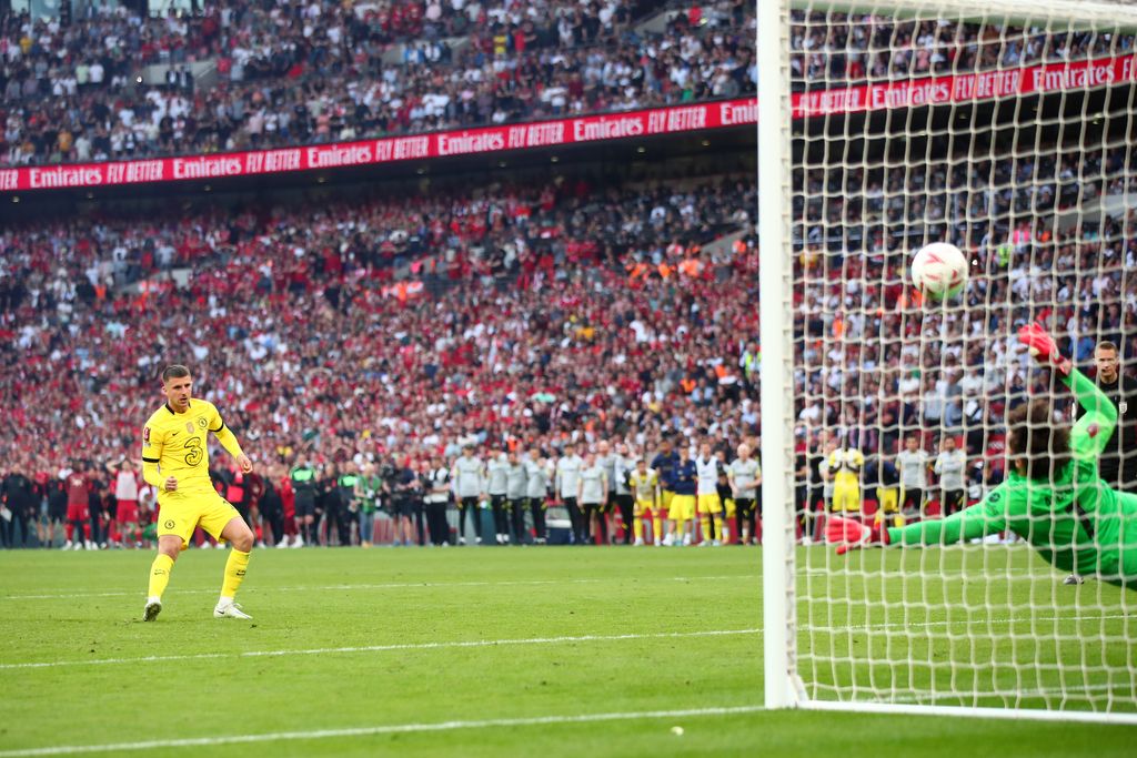 LONDON, ENGLAND - MAY 14: Mason Mount of Chelsea has his penalty saved by Alisson of Liverpool, the seventh during a penalty shoot out during The FA Cup Final match between Chelsea and Liverpool at Wembley Stadium on May 14, 2022 in London, England. (Photo by Marc Atkins/Getty Images)