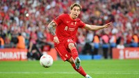 Kostas Tsimikas menjadi penendang ketujuh Liverpool. (Foto: The FA via Getty Images/Tom Dulat - The FA)