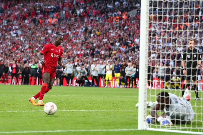 LONDON, ENGLAND - MAY 14: Sadio Mane of Liverpool looks dejected after having his penalty, the fifth in a shoot out, saved by Edouard Mendy of Chelsea during The FA Cup Final match between Chelsea and Liverpool at Wembley Stadium on May 14, 2022 in London, England. (Photo by Marc Atkins/Getty Images)
