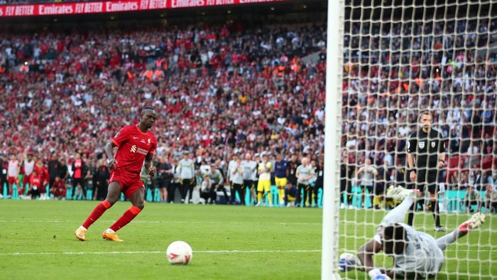 LONDON, ENGLAND - MAY 14: Sadio Mane of Liverpool has his penalty, the fifth penalty in a shoot out, saved by Edouard Mendy of Chelsea during The FA Cup Final match between Chelsea and Liverpool at Wembley Stadium on May 14, 2022 in London, England. (Photo by Marc Atkins/Getty Images)