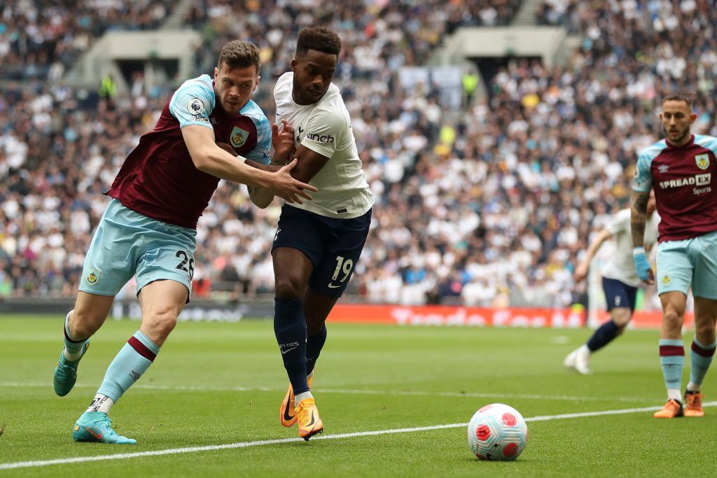 LONDON, ENGLAND - MAY 15: Harry Kane of Tottenham Hotspur is challenged by Connor Roberts of Burnley during the Premier League match between Tottenham Hotspur and Burnley at Tottenham Hotspur Stadium on May 15, 2022 in London, England. (Photo by Ryan Pierse/Getty Images)