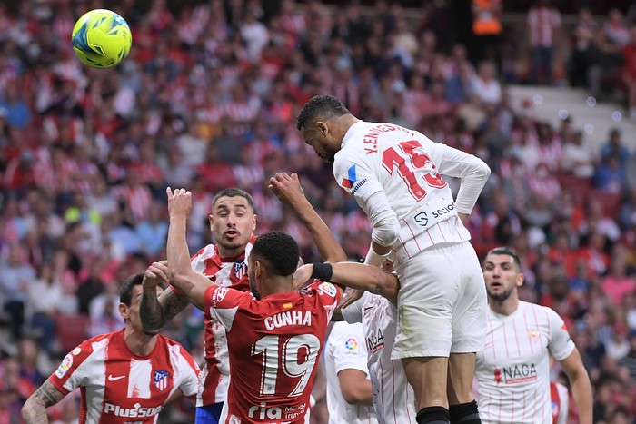 Sevillas Moroccan forward Youssef En-Nesyri heads the ball during the Spanish league football match between Club Atletico de Madrid and Sevilla FC at the Wanda Metropolitano stadium in Madrid on May 15, 2022. (Photo by Jose Jordan / AFP) (Photo by JOSE JORDAN/AFP via Getty Images)