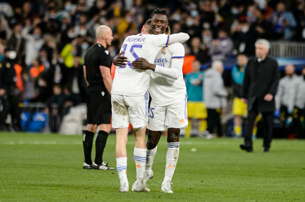 MADRID, SPAIN - MAY 04: Rodrygo of Real Madrid celebrates with team mate Eduardo Camavinga after scoring their sides second goal during the UEFA Champions League Semi Final Leg Two match between Real Madrid and Manchester City at Estadio Santiago Bernabeu on May 04, 2022 in Madrid, Spain. (Photo by Angel Martinez/Getty Images)