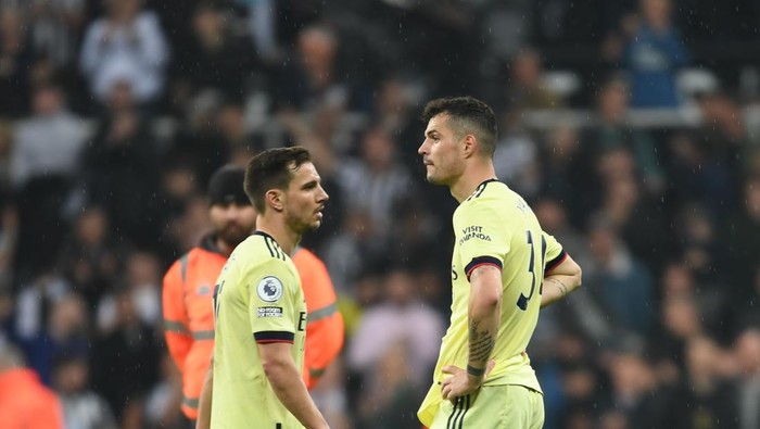 NEWCASTLE UPON TYNE, ENGLAND - MAY 16: (L-R) Cedric and Granit Xhaka of Arsenal after the Premier League match between Newcastle United and Arsenal at St. James Park on May 16, 2022 in Newcastle upon Tyne, England. (Photo by Stuart MacFarlane/Arsenal FC via Getty Images)