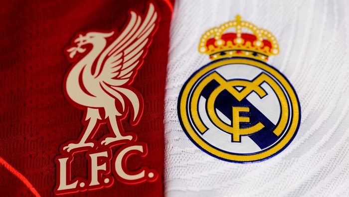 NYON, SWITZERLAND - MAY 6: A detailed view of the Liverpool FC and Real Madrid CF badges during the UEFA Champions League Final 2021/22 Jerseys Shoot at the UEFA Headquarters, The House of the European Football, on May 6, 2022, in Nyon, Switzerland. (Photo by Kristian Skeie - UEFA/UEFA via Getty Images)