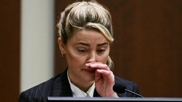 Actor Amber Heard testifies in the courtroom at the Fairfax County Circuit Courthouse in Fairfax, Va., Monday, May 16, 2022.  Steve Helber/Pool via REUTERS