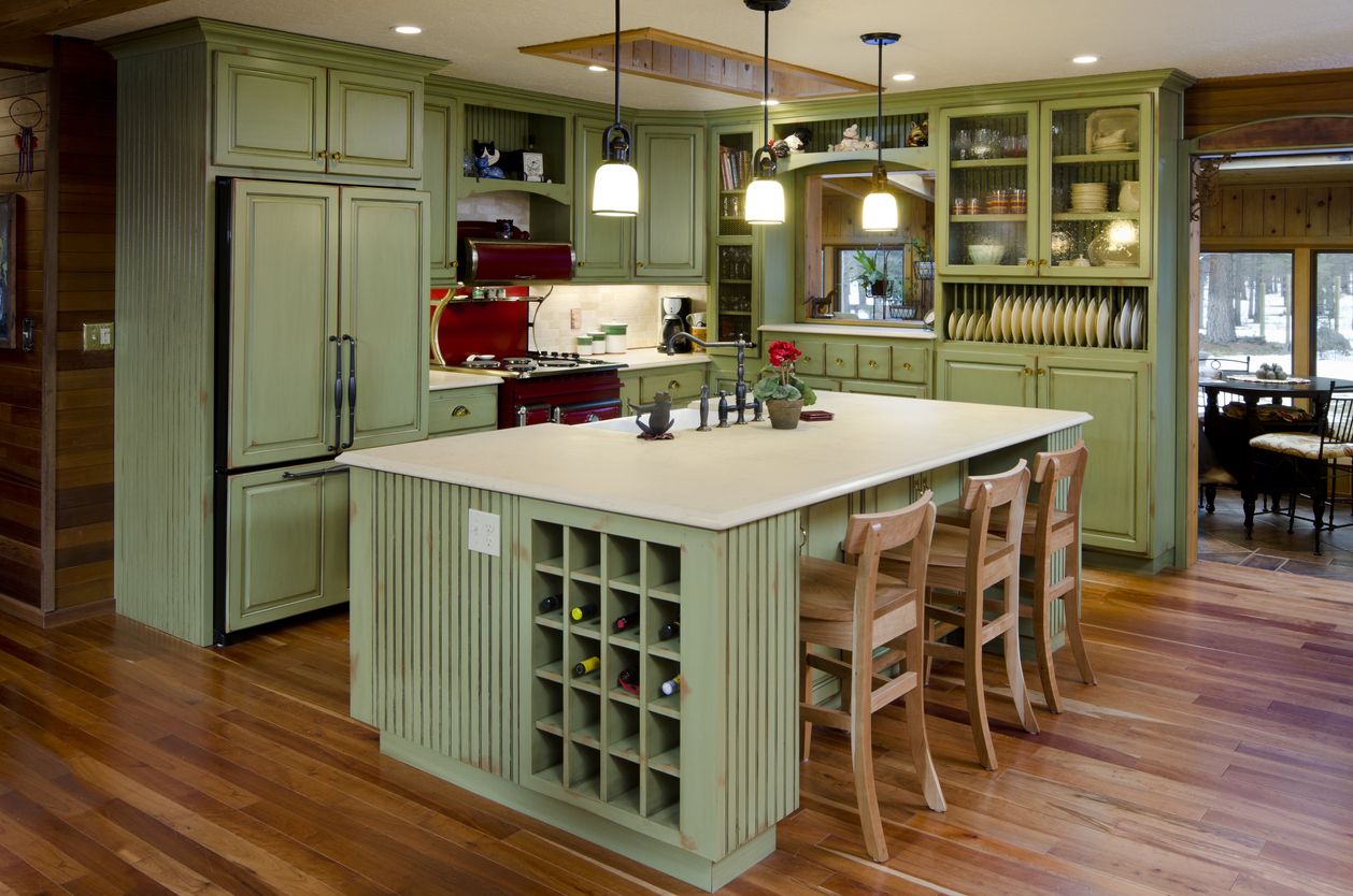 This kitchen is done in lime green and is modern.