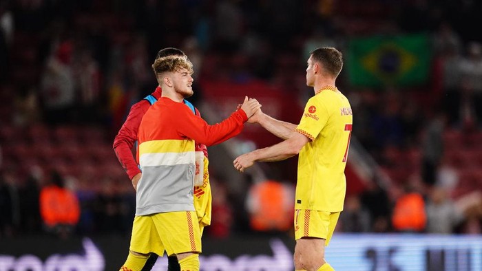 Liverpools Harvey Elliott and James Milner celebrate after the Premier League match at St Marys Stadium, Southampton. Picture date: Tuesday May 17, 2022. (Photo by John Walton/PA Images via Getty Images)