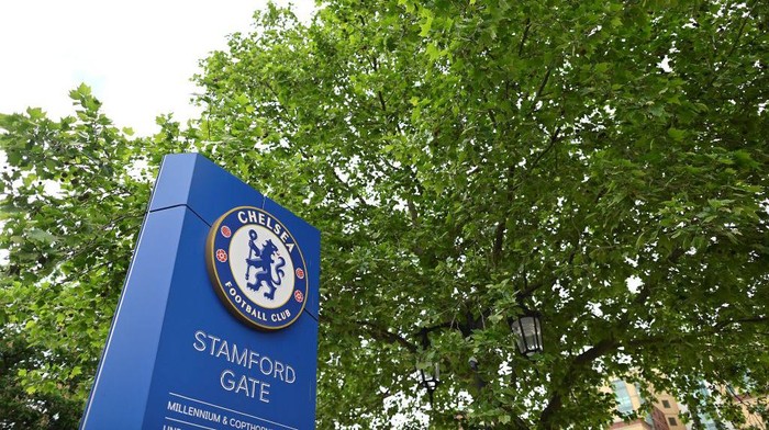A logo is pictured on a sign ahead of the English Premier League football match between Chelsea and Wolverhampton Wanderers at Stamford Bridge in London on May 7, 2022. - Chelsea confirmed on Saturday that a consortium led by LA Dodgers co-owner Todd Boehly has won the battle to buy the Premier League club in a £4.25 billion ($5.2 billion) deal. (Photo by JUSTIN TALLIS / AFP) (Photo by JUSTIN TALLIS/AFP via Getty Images)