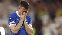 Aaron Ramsey nampaknya sedang tak menjalani karier yang bagus musim ini. Usai didepak oleh Juventus, ia pun gagal mempersembahkan gelar Liga Europa untuk Rangers FC. REUTERS/John Sibley