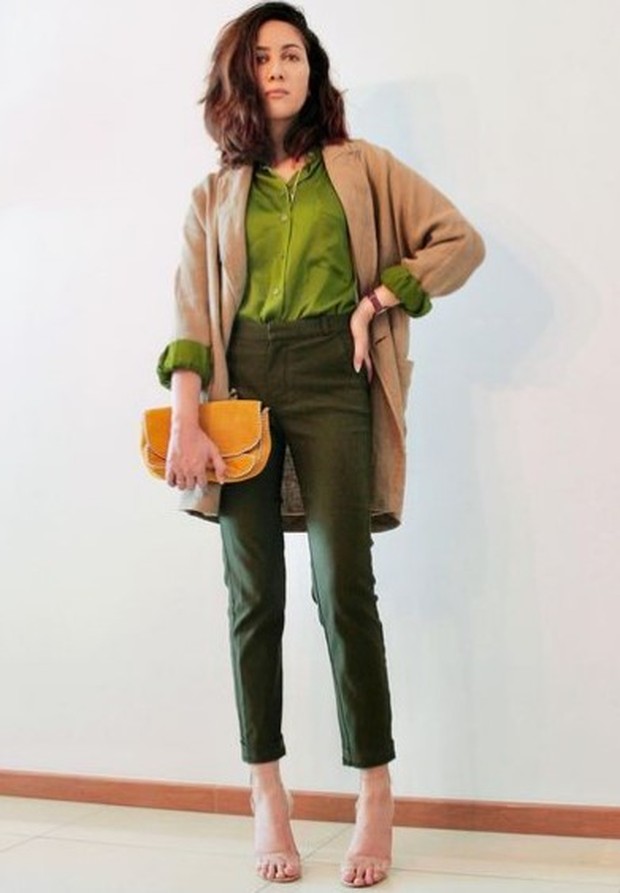 Suhay Salim dalam paduan warna olive green dan cokelat