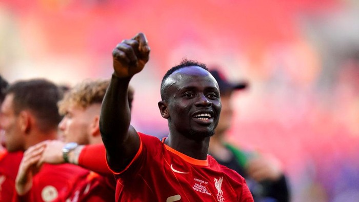Liverpools Sadio Mane celebrates after winning the Emirates FA Cup final at Wembley Stadium, London. Picture date: Saturday May 14, 2022. (Photo by Adam Davy/PA Images via Getty Images)