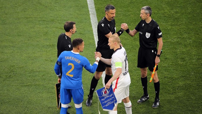 Rangers' James Tavernier and Eintracht Frankfurt's Sebastian Rode shake hands during the UEFA Europa League Final at the Estadio Ramon Sanchez-Pizjuan, Seville. Picture date: Wednesday May 18, 2022. (Photo by Isabel Infantes/PA Images via Getty Images)