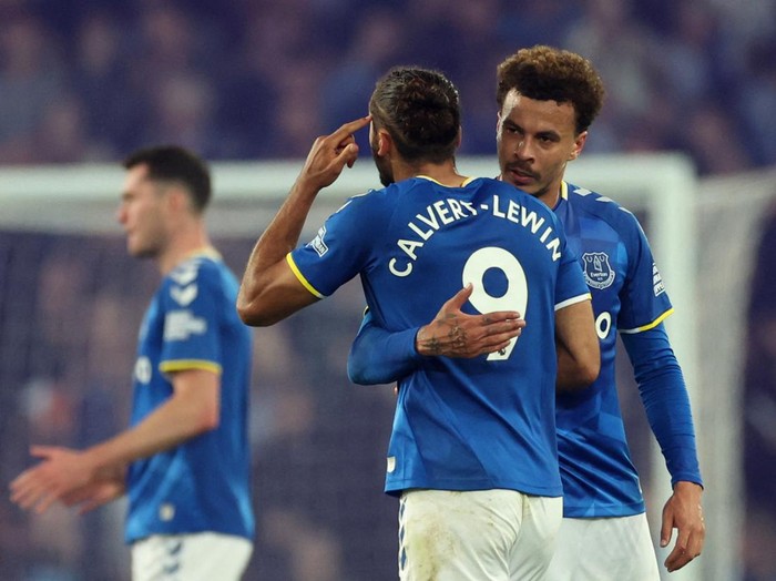 Soccer Football - Premier League - Everton v Crystal Palace - Goodison Park, Liverpool, Britain - May 19, 2022 Everton's Dominic Calvert-Lewin scores their third goal as a bottle is seen in the foreground Action Images via Reuters/Carl Recine EDITORIAL USE ONLY. No use with unauthorized audio, video, data, fixture lists, club/league logos or 'live' services. Online in-match use limited to 75 images, no video emulation. No use in betting, games or single club /league/player publications.  Please contact your account representative for further details.