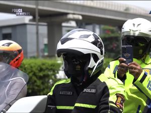 Polisi Bisa Tilang Pakai Kamera HP, Begini Cara Kerjanya Polisi Bisa Tilang Pakai Kamera HP, Begini Cara Kerjanya