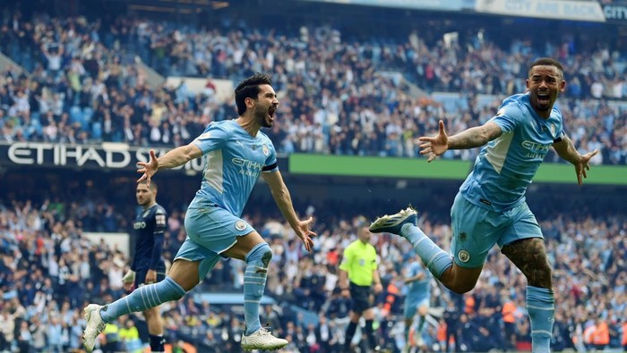 MANCHESTER, ENGLAND - MAY 22: Ilkay Guendogan of Manchester City celebrates after scoring their teams third goal during the Premier League match between Manchester City and Aston Villa at Etihad Stadium on May 22, 2022 in Manchester, England. (Photo by Michael Regan/Getty Images)