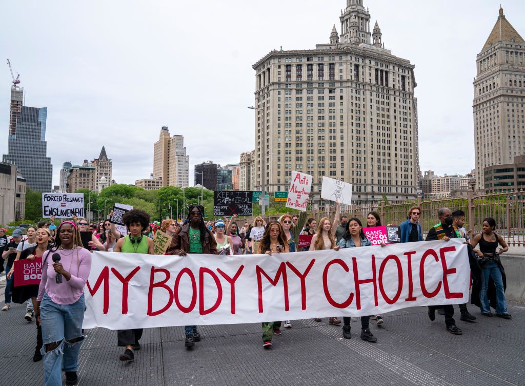 NEW YORK, NY - MAY 14: Abortion-rights supporters march to Brooklyn Bridge in support of a Planned Parenthood demonstration on May 14, 2022, in New York City. Multiple US organizations that support abortion rights called for nationwide protests after a leaked draft opinion showed the US Supreme Court poised to overturn its landmark Roe v. Wade decision. (Photo by Robert Nickelsberg/Getty Images)