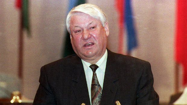 Russian President Boris Yeltsin addresses the 9th Congress of People's Deputies of Russia 27 March, 1993 in Moscow. Yeltsin asked Congress 27 March to drop  new attempts to remove him from office. (Photo by DIMA TANIN / AFP)