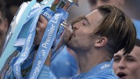 Manajer Man City, Pep Guardiola, menilai gelar juara Man City musim ini begitu spesial karena di raih dengan perjuangan yang luar biasa. (Photo by Visionhaus/Getty Images).