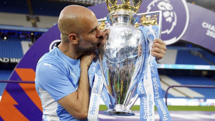 Ekspresi Kemenangan Pemain Manchester City Sang Juara Liga Inggris Manchester City meraih gelar Juara Liga Inggris 2021/2022. The Citizens unggul 3-2 atas Aston Villa saat bertanding di Etihad Stadium, Minggu (22/5) malam.