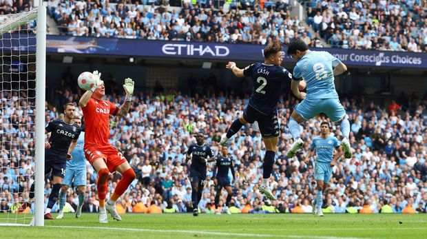 Soccer Football - Premier League - Manchester City v Aston Villa - Etihad Stadium, Manchester, Britain - May 22, 2022 Manchester City's Ilkay Gundogan scores their first goal REUTERS/Hannah Mckay EDITORIAL USE ONLY. No use with unauthorized audio, video, data, fixture lists, club/league logos or 'live' services. Online in-match use limited to 75 images, no video emulation. No use in betting, games or single club /league/player publications.  Please contact your account representative for further details.