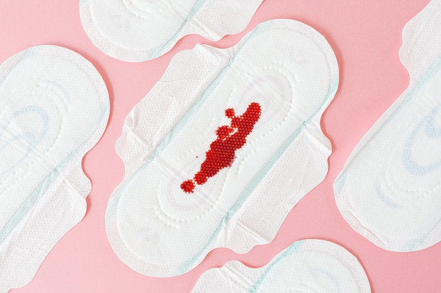 Ilustrasi darah menstruasi warna merah gelap