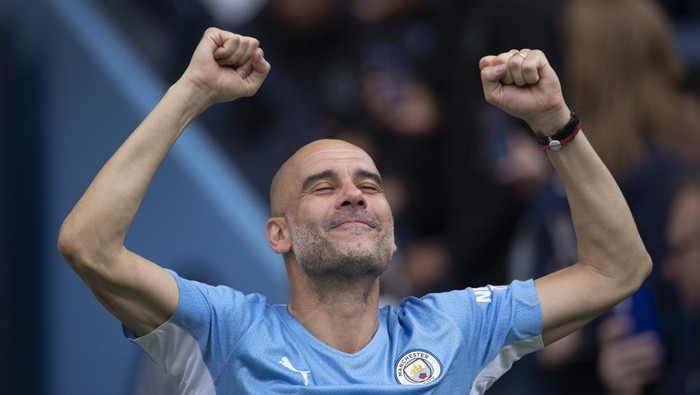 MANCHESTER, ENGLAND - MAY 22: Manchester City manager Pep Guardiola acknowledges the fans after the Premier League match between Manchester City and Aston Villa at Etihad Stadium on May 22, 2022 in Manchester, United Kingdom. (Photo by Visionhaus/Getty Images)