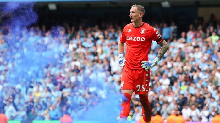 MANCHESTER, ENGLAND - MAY 22: Robin Olsen of Aston Villa throws a blue flare during the Premier League match between Manchester City and Aston Villa at Etihad Stadium on May 22, 2022 in Manchester, England. (Photo by James Gill - Danehouse/Getty Images)