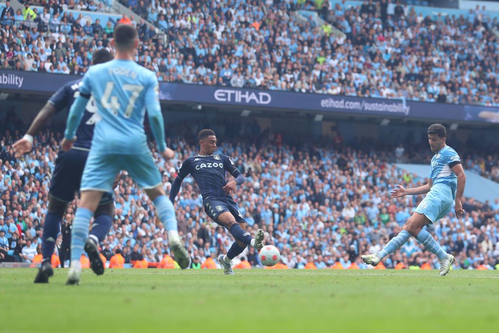 MANCHESTER, ENGLAND - MAY 22: Rodri of Manchester City scores a goal to make it 2-2 during the Premier League match between Manchester City and Aston Villa at Etihad Stadium on May 22, 2022 in Manchester, United Kingdom. (Photo by Robbie Jay Barratt - AMA/Getty Images)