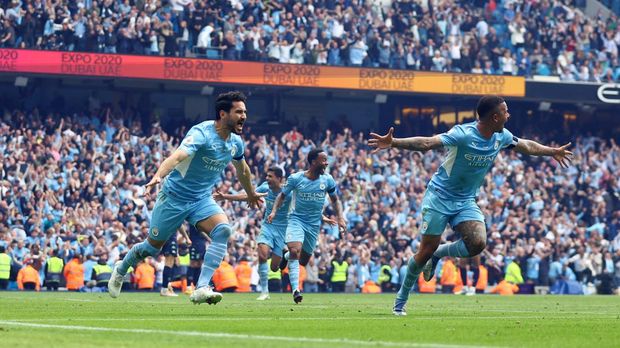 Soccer Football - Premier League - Manchester City v Aston Villa - Etihad Stadium, Manchester, Britain - May 22, 2022 Manchester City's Ilkay Gundogan celebrates scoring their third goal with Gabriel Jesus REUTERS/Hannah Mckay EDITORIAL USE ONLY. No use with unauthorized audio, video, data, fixture lists, club/league logos or 'live' services. Online in-match use limited to 75 images, no video emulation. No use in betting, games or single club /league/player publications.  Please contact your account representative for further details.