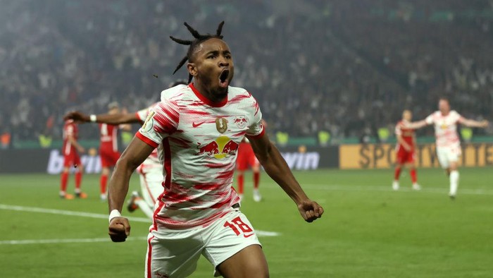 BERLIN, GERMANY - MAY 21: Christopher Nkunku of RB Leipzig celebrates after scoring their sides first goal during the final match of the DFB Cup 2022 between SC Freiburg and RB Leipzig at Olympiastadion on May 21, 2022 in Berlin, Germany. (Photo by Martin Rose/Getty Images)