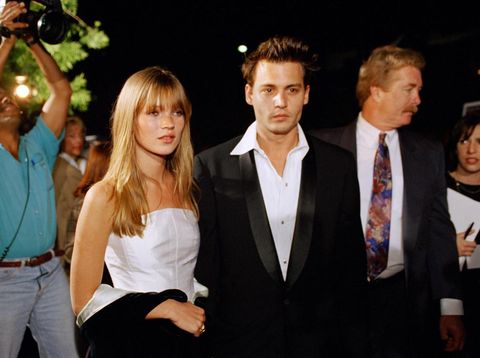 Actor Johnny Depp and his girlfriend supermodel Kate Moss are seen arriving for the premiere of Depp's film 