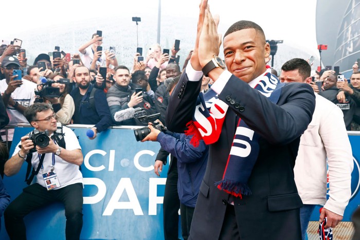 PARIS, FRANCE - MAY 23:  Kilian Mbappe greets fans after signing a new contract at Paris Saint-Germainat Parc des Princes on May 23, 2022 in Paris, France. (Photo by Julien Hekimian - PSG/PSG via Getty Images)