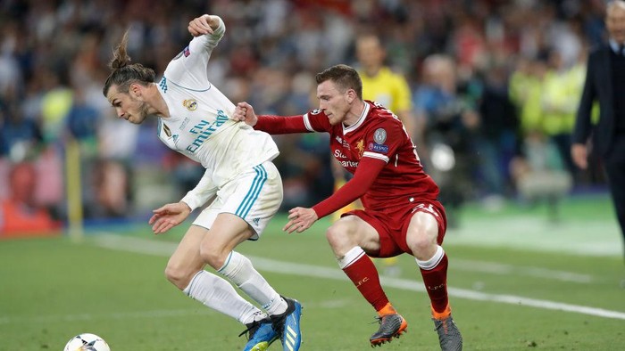 Gareth Bale (left) escapes from Andy Robertson during the Real Madrid v Liverpool Champions League final 2018 at the Olympic Stadium, Kiev on May 26th 2018 in Ukraine (Photo by Tom Jenkins)