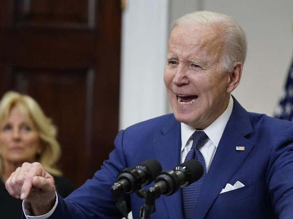 President Joe Biden speaks about the mass shooting at Robb Elementary School in Uvalde, Texas, from the White House, in Washington, Tuesday, May 24, 2022, as first lady Jill Biden listens. (AP Photo/Manuel Balce Ceneta)