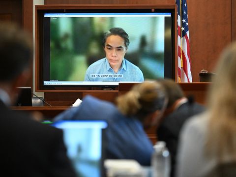 President, DC-Based Film Production, Warner Bros. Pictures, Walter Hamada, in pre-recorded testimony speaks during trial at the Fairfax County Circuit Courthouse in Fairfax, Virginia, on May 24, 2022. Actor Johnny Depp is suing ex-wife Amber Heard for libel after she wrote an op-ed piece in The Washington Post in 2018 referring to herself as a “public figure representing domestic abuse.”