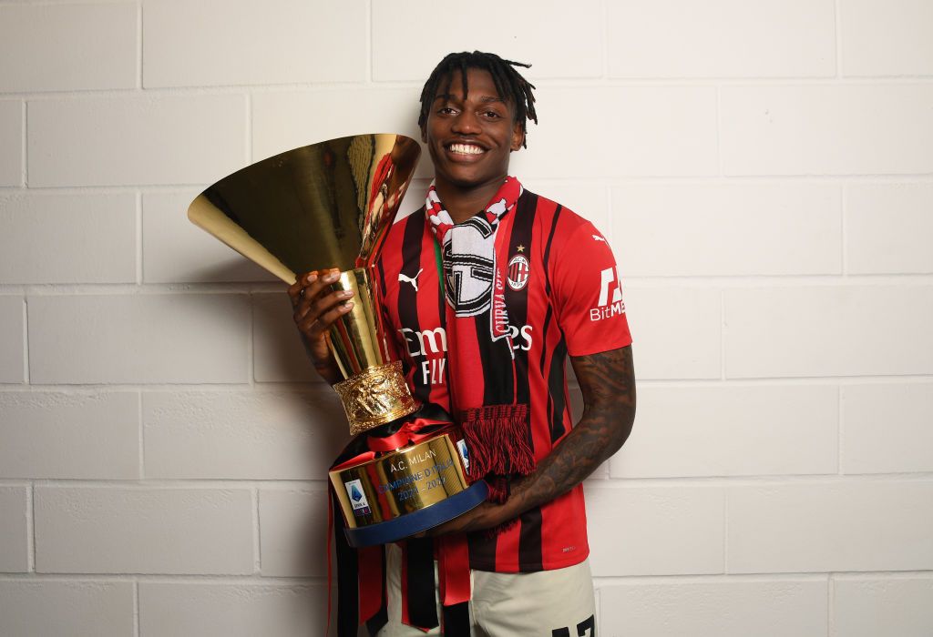 REGGIO NELL'EMILIA, ITALY - MAY 22:  Rafael Leao of AC Milan poses with the trophy for the victory of 
