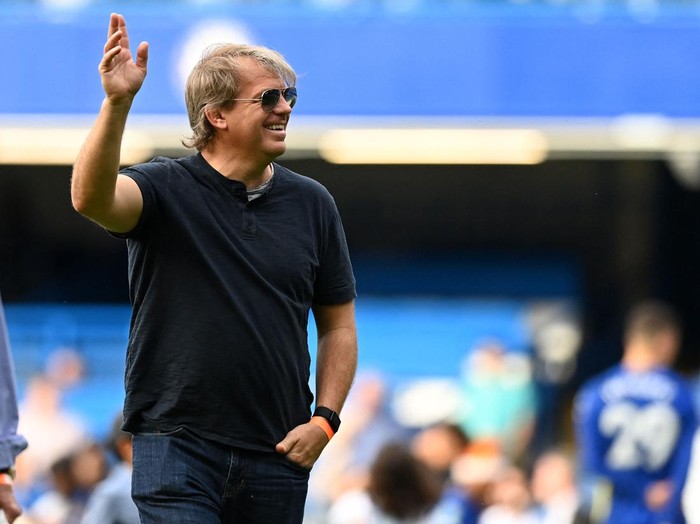 Chelsea's prospective US owner Todd Boehly comes onto the pitch to join the lap of honour after the English Premier League football match between Chelsea and Watford at Stamford Bridge in London on May 22, 2022. - RESTRICTED TO EDITORIAL USE. No use with unauthorized audio, video, data, fixture lists, club/league logos or 'live' services. Online in-match use limited to 120 images. An additional 40 images may be used in extra time. No video emulation. Social media in-match use limited to 120 images. An additional 40 images may be used in extra time. No use in betting publications, games or single club/league/player publications. (Photo by Glyn KIRK / AFP) / RESTRICTED TO EDITORIAL USE. No use with unauthorized audio, video, data, fixture lists, club/league logos or 'live' services. Online in-match use limited to 120 images. An additional 40 images may be used in extra time. No video emulation. Social media in-match use limited to 120 images. An additional 40 images may be used in extra time. No use in betting publications, games or single club/league/player publications. / RESTRICTED TO EDITORIAL USE. No use with unauthorized audio, video, data, fixture lists, club/league logos or 'live' services. Online in-match use limited to 120 images. An additional 40 images may be used in extra time. No video emulation. Social media in-match use limited to 120 images. An additional 40 images may be used in extra time. No use in betting publications, games or single club/league/player publications. (Photo by GLYN KIRK/AFP via Getty Images)