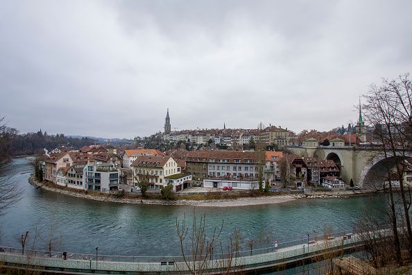 BERN, SWITZERLAND - JANUARY 01 : Panoramic view of  The old town the medieval city center of Bern and the Aare River on January 01, 2019 in Bern, Switzerland. The old town is the medieval city center of Bern. Bern is the capital city of Switzerland, is built around the Aare River.  Its origins back to the 12th century, with medieval architecture preserved in the Old Town. It is a UNESCO Cultural World Heritage Site since 1983 due to the compact and generally intact medieval core. (Photo by Athanasios Gioumpasis/Getty Images)