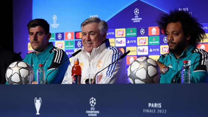 PARIS, FRANCE - MAY 27: Thibaut Courtois, Carlo Ancelotti and Marcelo of Real Madrid speak to the media during the Real Madrid Press Conference at Stade de France on May 27, 2022 in Paris, France. Real Madrid will face Liverpool in the UEFA Champions League final on May 28, 2022. (Photo by Alexander Hassenstein - UEFA/UEFA via Getty Images)