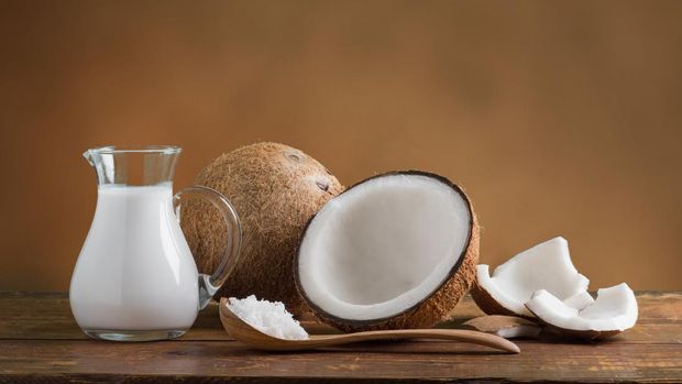 Coconut Milk with fresh coconut for alternative therapy, spa theme
