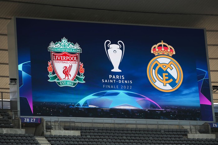 PARIS, FRANCE - MAY 27: The club crests of Liverpool and Real Madrid are seen on the giant screen during the Liverpool FC Training Session at Stade de France on May 27, 2022 in Paris, France. Liverpool will face Real Madrid in the UEFA Champions League final on May 28, 2022. (Photo by Marc Atkins/Getty Images)