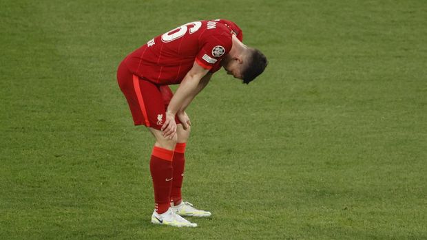 Soccer Football - Champions League Final - Liverpool v Real Madrid - Stade de France, Saint-Denis near Paris, France - May 28, 2022  Liverpool's Andrew Robertson looks dejected after losing the Champions League final REUTERS/Gonzalo Fuentes
